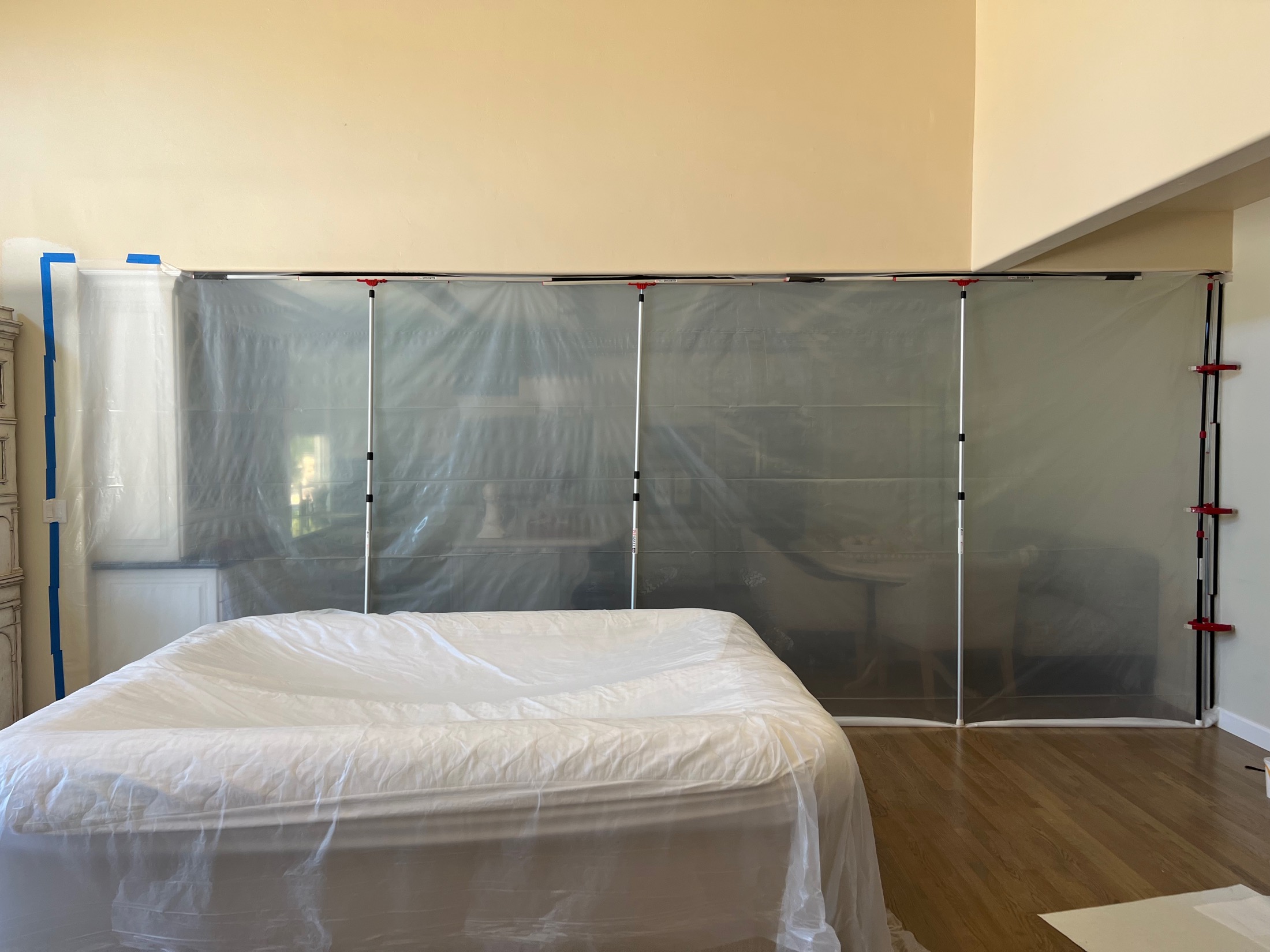 Plastic dust barrier installed during bathroom remodel in Carmel Valley home