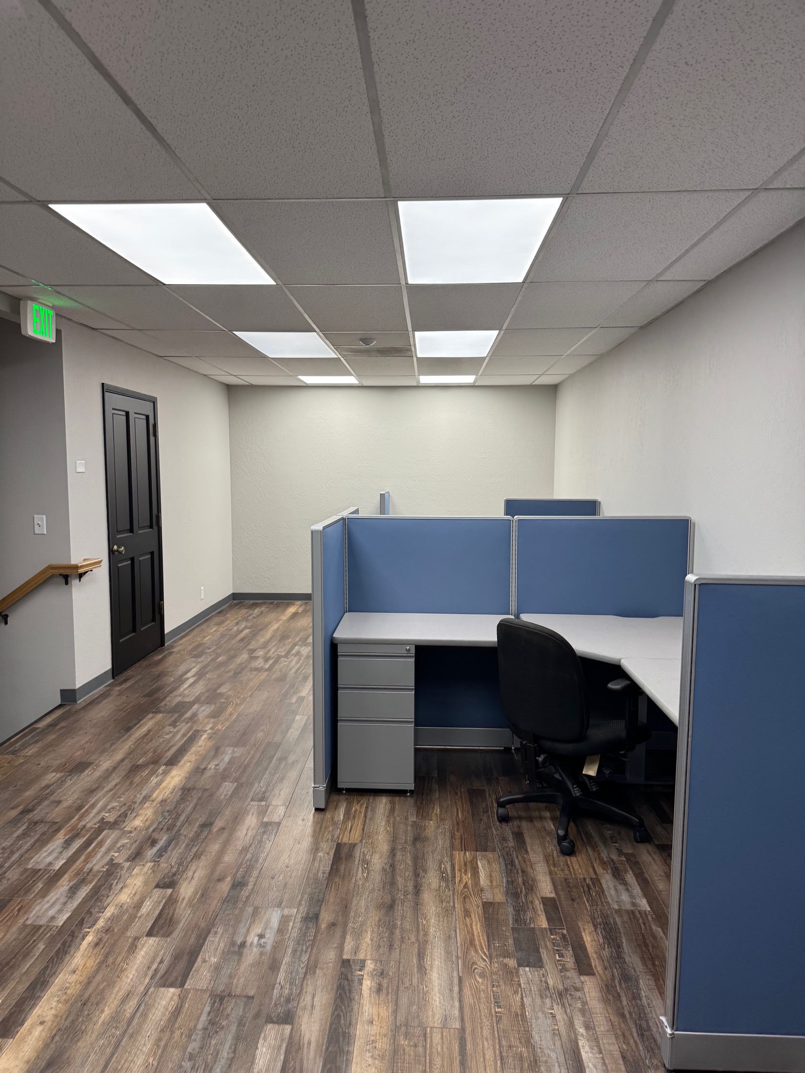 Gilroy commercial office workstation with blue partitions and file cabinets
