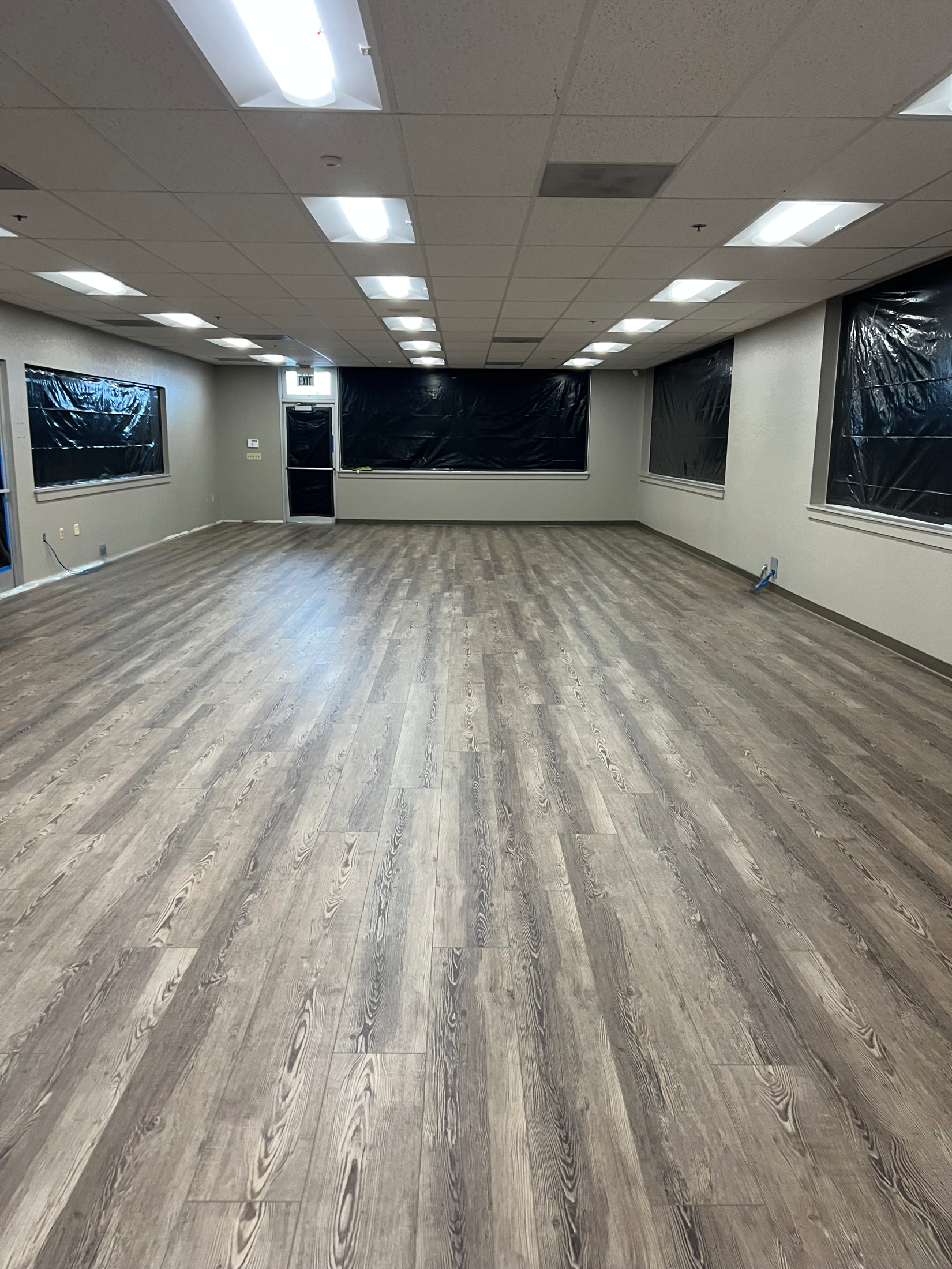 Salinas commercial space with new LVP flooring ready for tenant fit-out